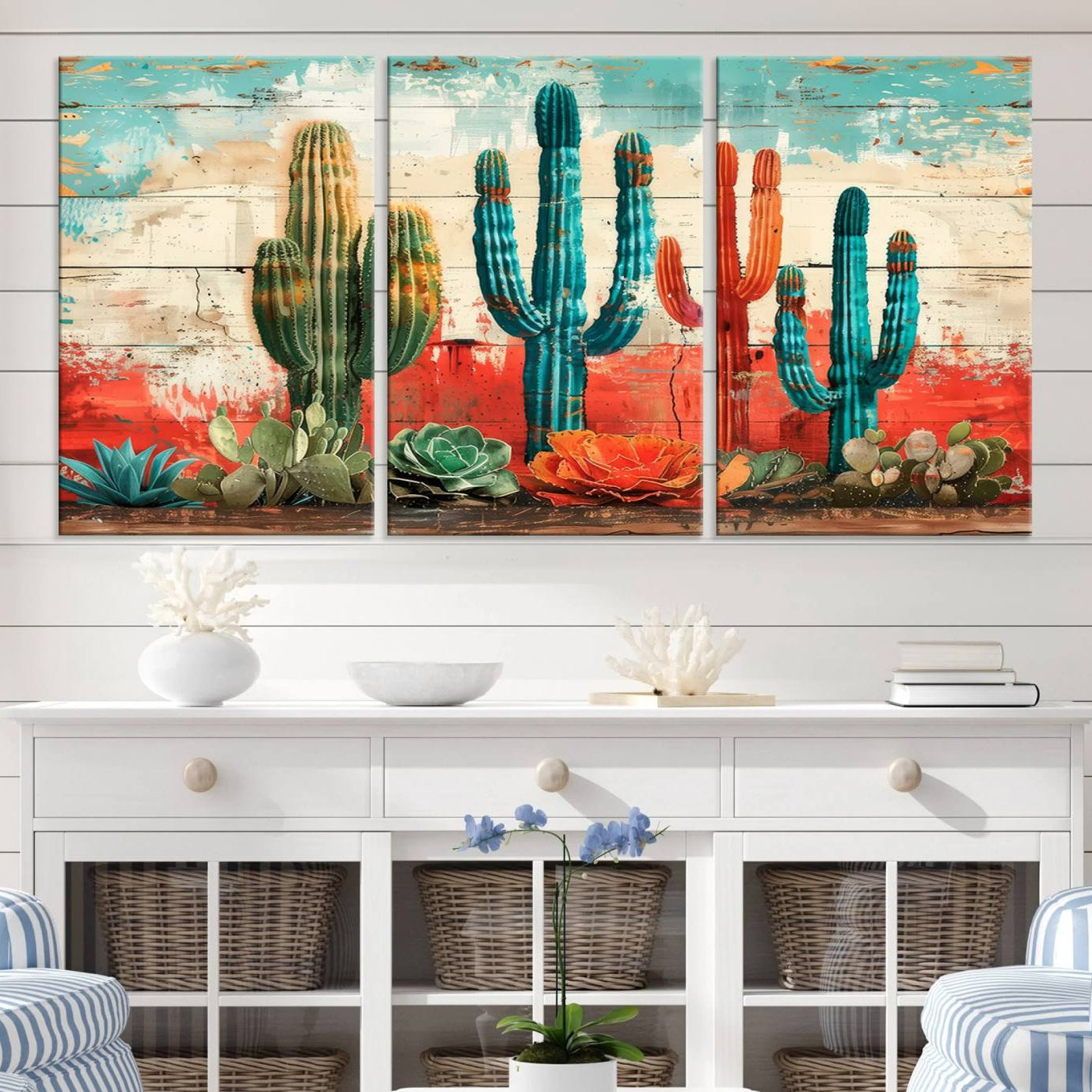 A vivid southwestern-style artwork featuring an eclectic mix of cacti and succulents painted against a textured, rustic wood backdrop in rich turquoise, red, and orange hues.