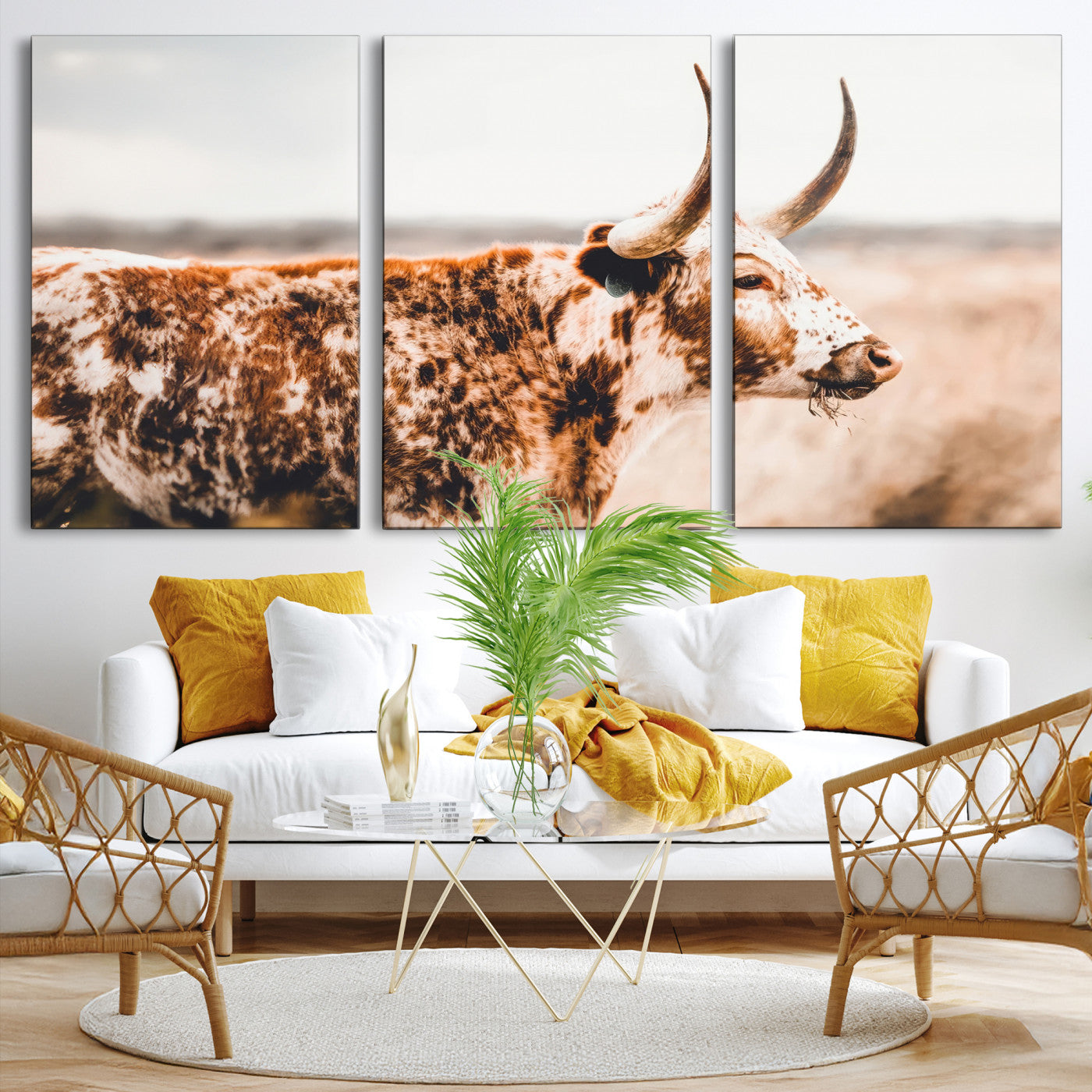 Speckled Texas longhorn with curved horns standing in a warm-toned prairie, perfect for rustic or country-style home decor.
