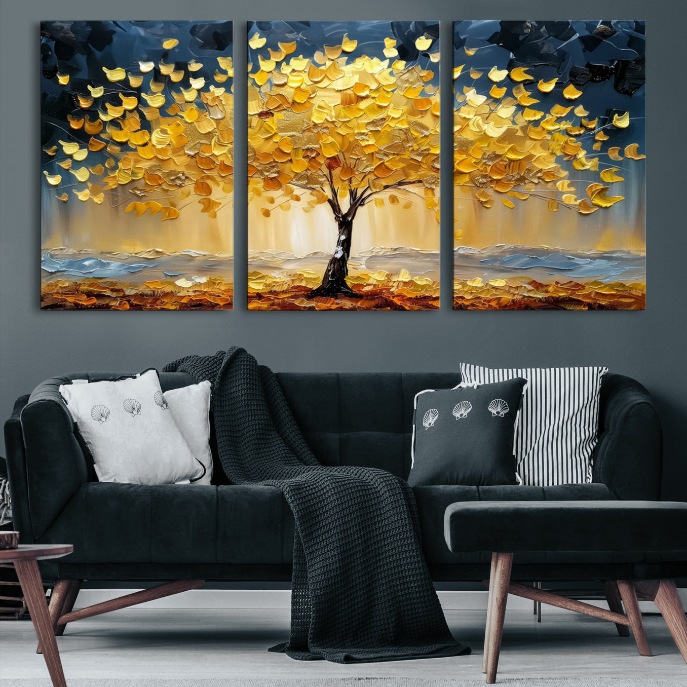 Canvas of a golden autumn tree with textured brushstrokes and moody blue skies, perfect for dramatic and vibrant home decor.