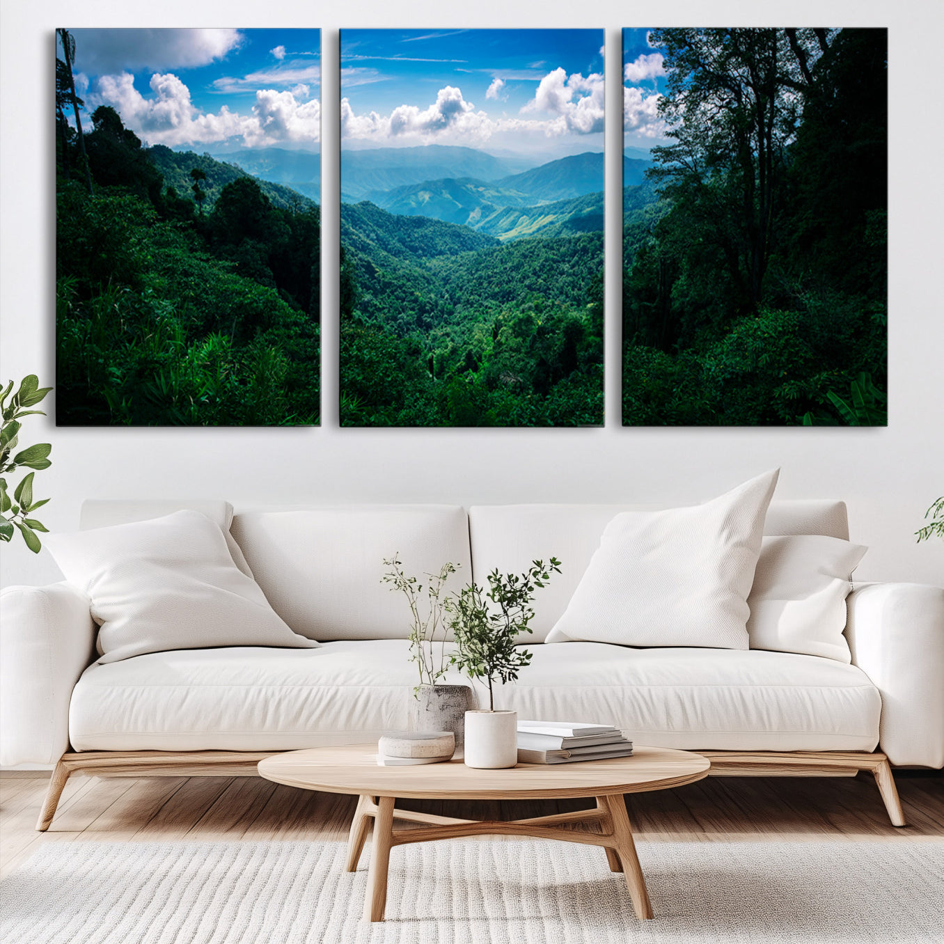Canvas of a misty tropical jungle with vibrant greenery and layered blue mountains, ideal for exotic nature-themed wall décor.