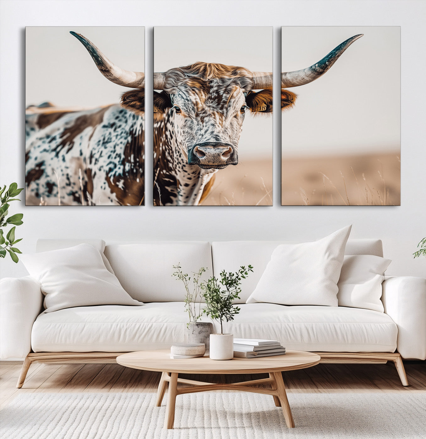 Canvas of a speckled Texas longhorn with wide curved horns and warm tones, perfect for rustic or country-style wall decor.