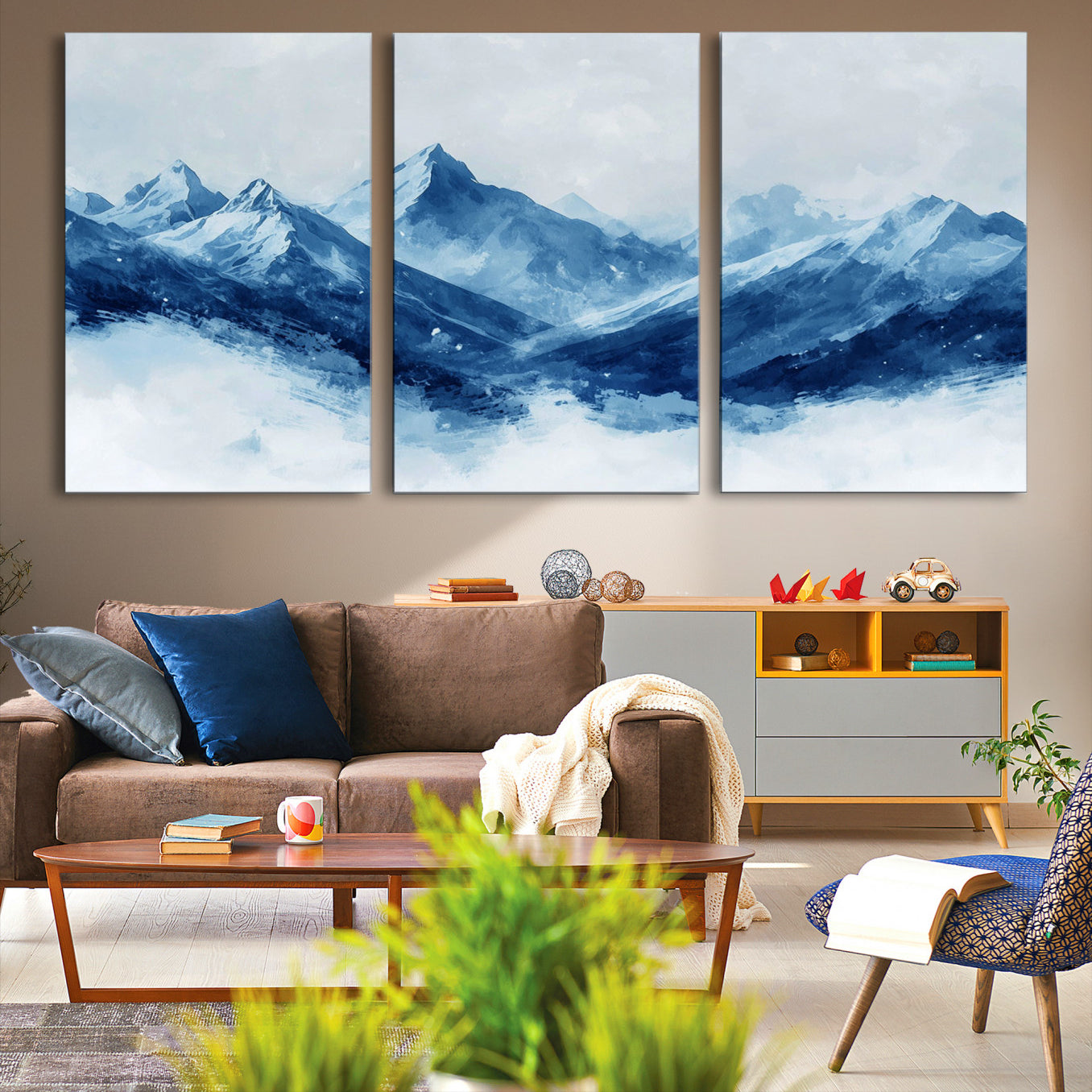 Peaceful watercolor-style painting of snowy blue mountains in soft tones, perfect for winter-themed or minimalist wall decor.