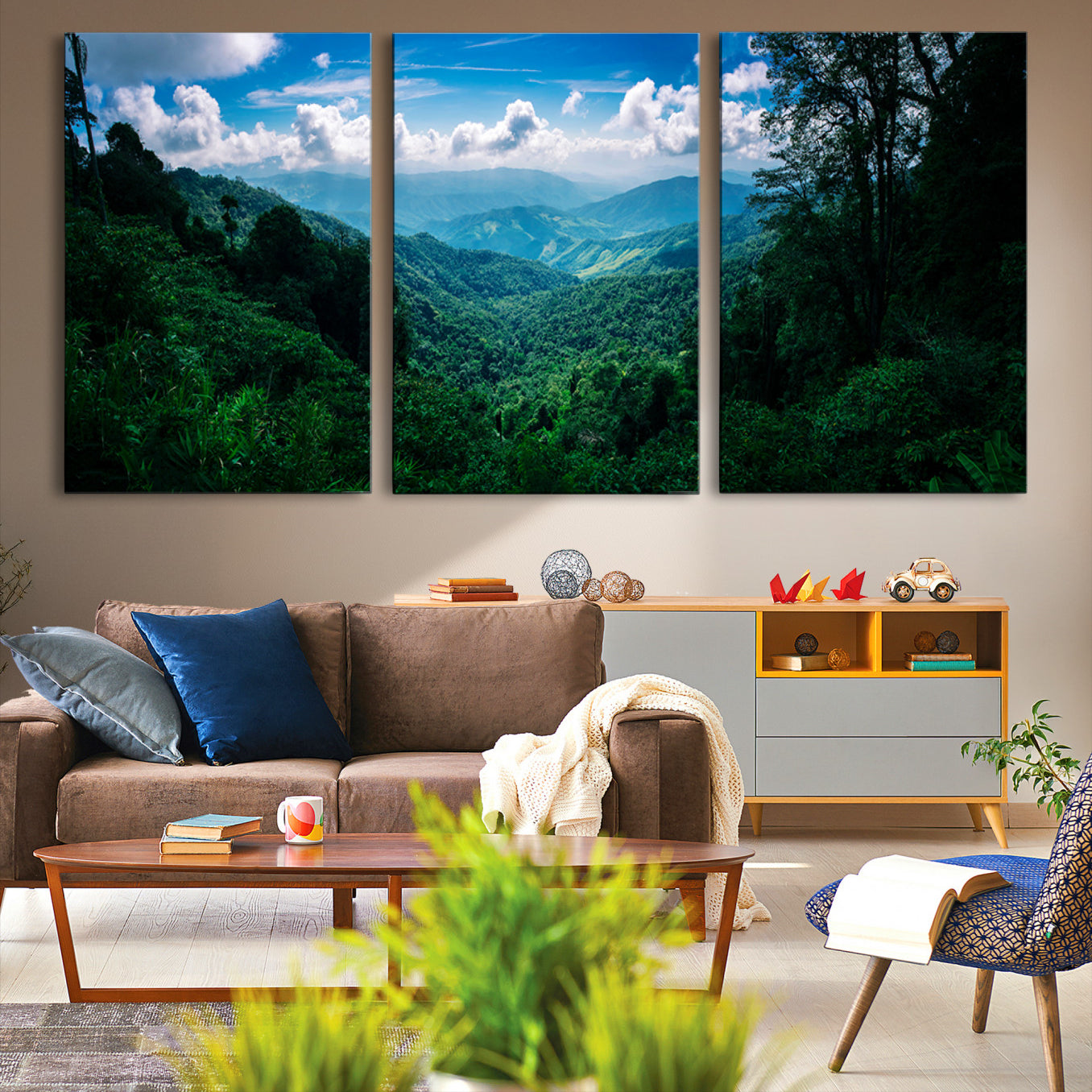 Canvas of a misty tropical jungle with vibrant greenery and layered blue mountains, ideal for exotic nature-themed wall décor.