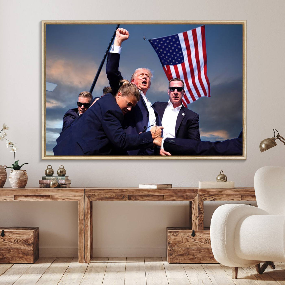 The wall art features a framed photo of a man enthusiastically holding an American flag, surrounded by people in suits, set against a dramatic sky.