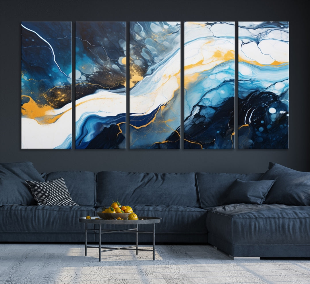 The Navy Blue Abstract Wall Art Canvas Print, displaying an exquisite array of blue, white, and gold swirls, is crafted on museum-quality canvas and enhances the space with its sophisticated elegance.