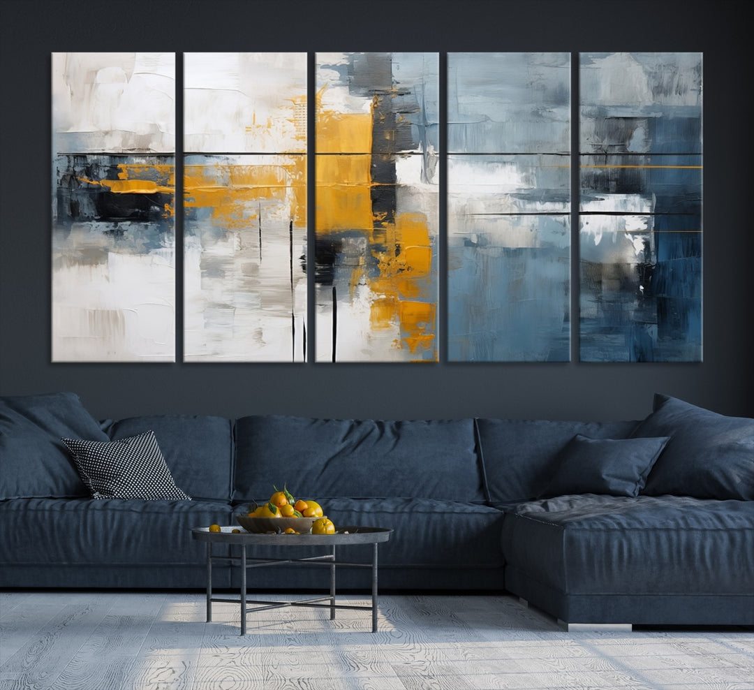 The Orange Abstract Wall Art Print features a series of white, blue, black, and yellow blocks arranged in a triptych format on museum-quality canvases. Proudly made in the USA and offered with free shipping.