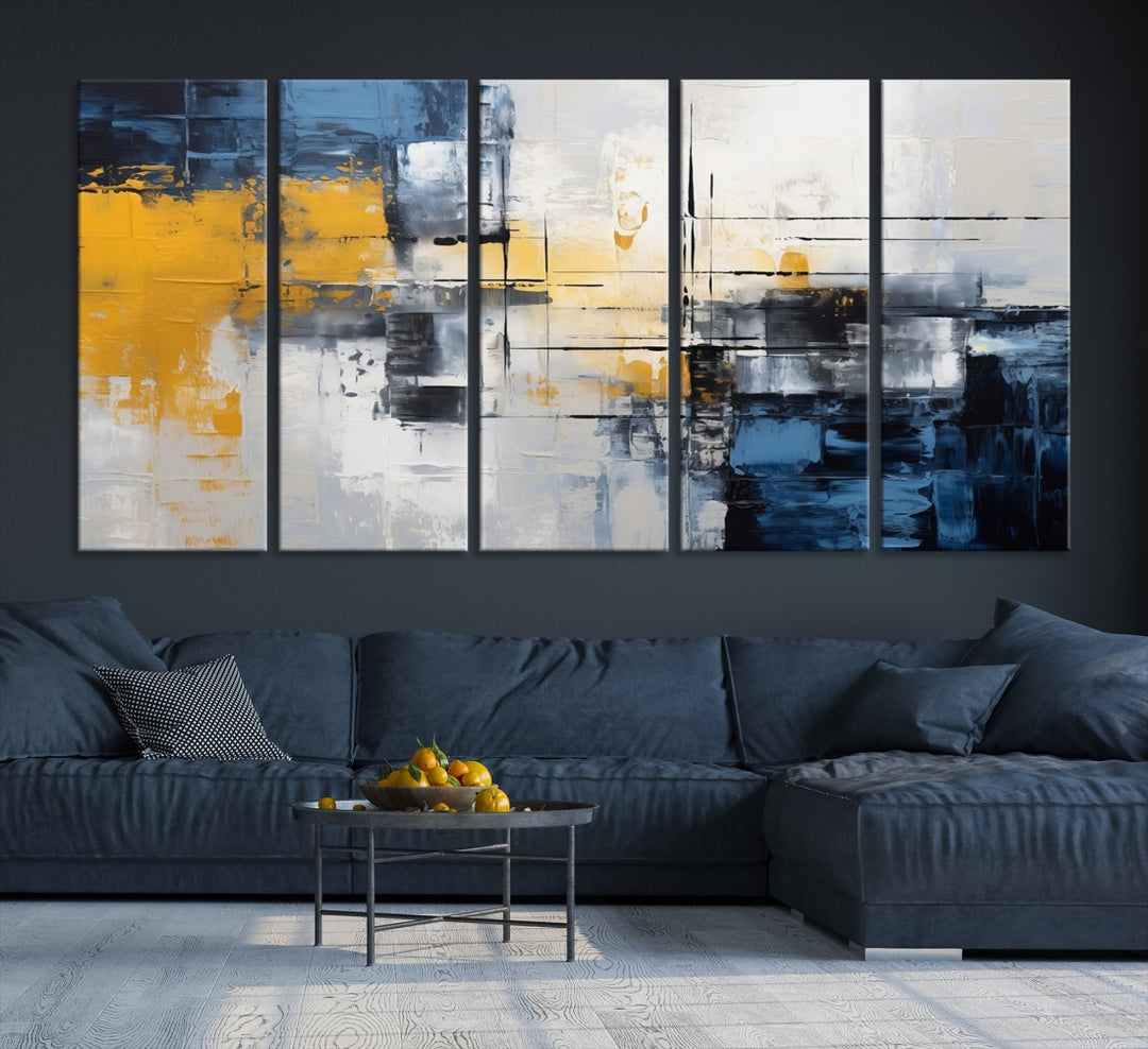 The Yellow Orange Blue Abstract Wall Art Print on gallery-wrapped, museum-quality canvases adds a vibrant touch to the room.