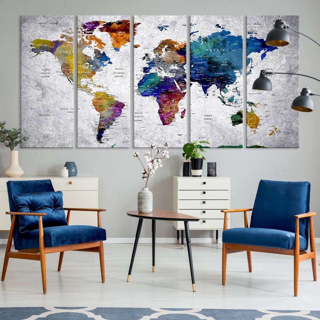 The World Map Art Canvas Print, featuring country names on a grunge-stained gray background, is perfect for stylish home decor.