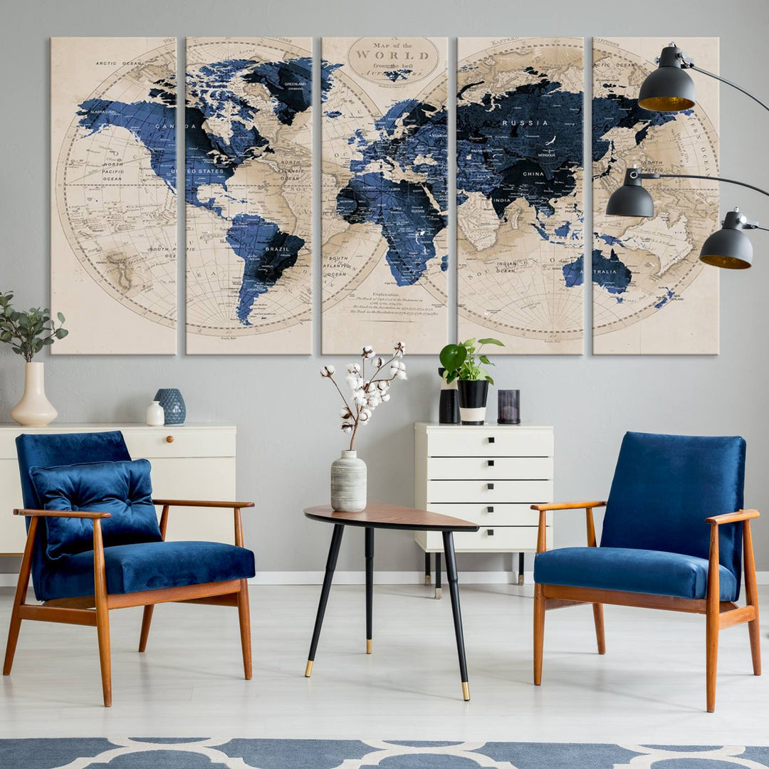 The Vintage Triptych Map Print is a grunge-stained blue and beige world map, perfect for enhancing wall decor.