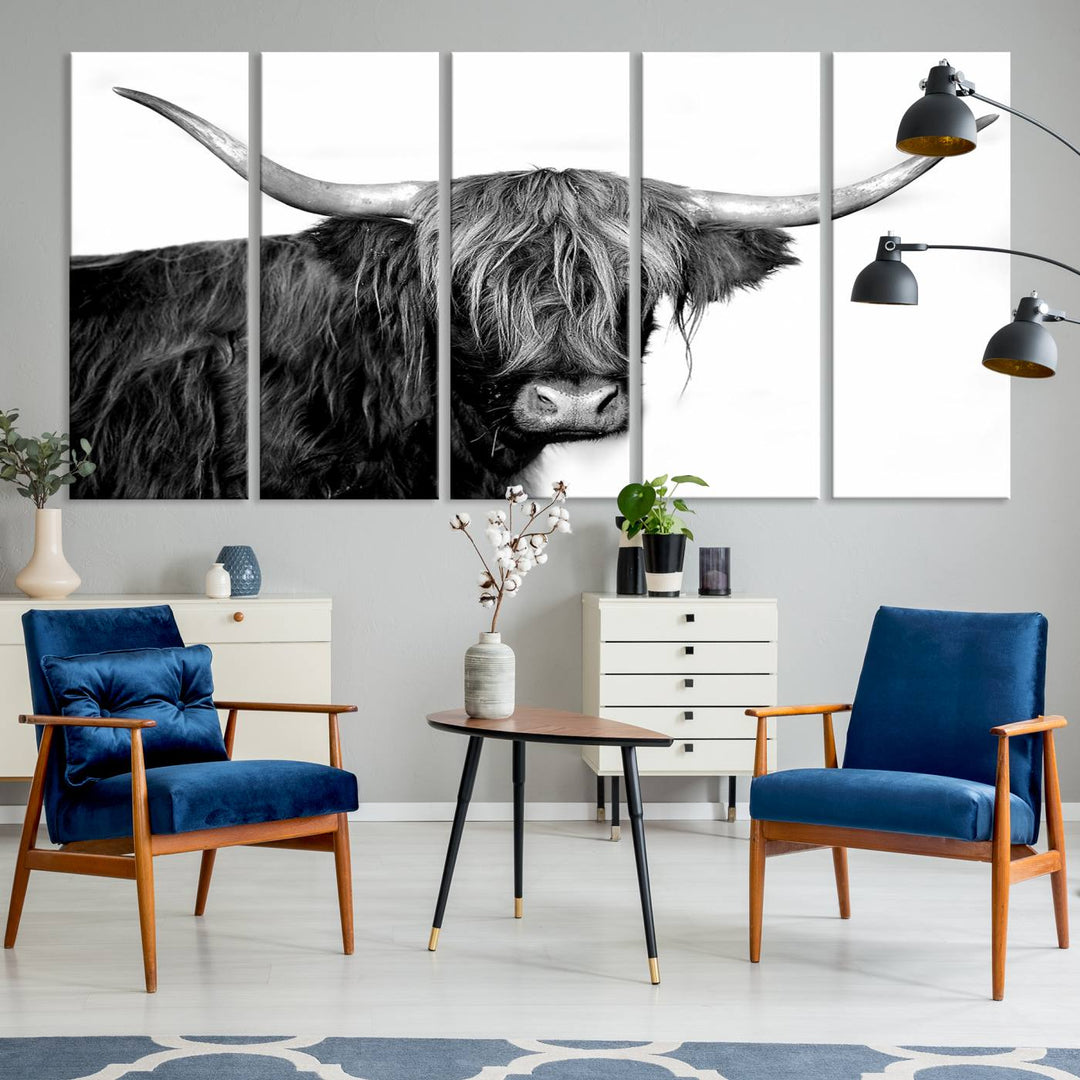 The Black and White Highland Cow Multi Panel Wall Art Canvas Print with UV-protection hangs prominently.