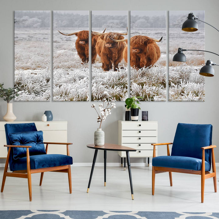 The Highland Cows in Snow canvas showcases three cattle in a frosty field.