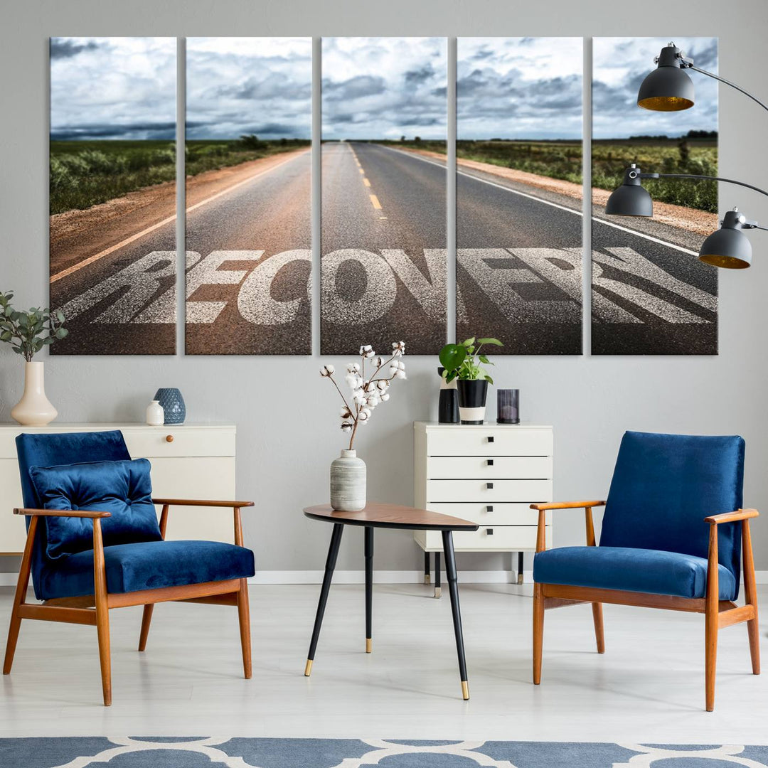 The Recovery Road Wall Art Canvas Print depicts a road under a cloudy horizon.