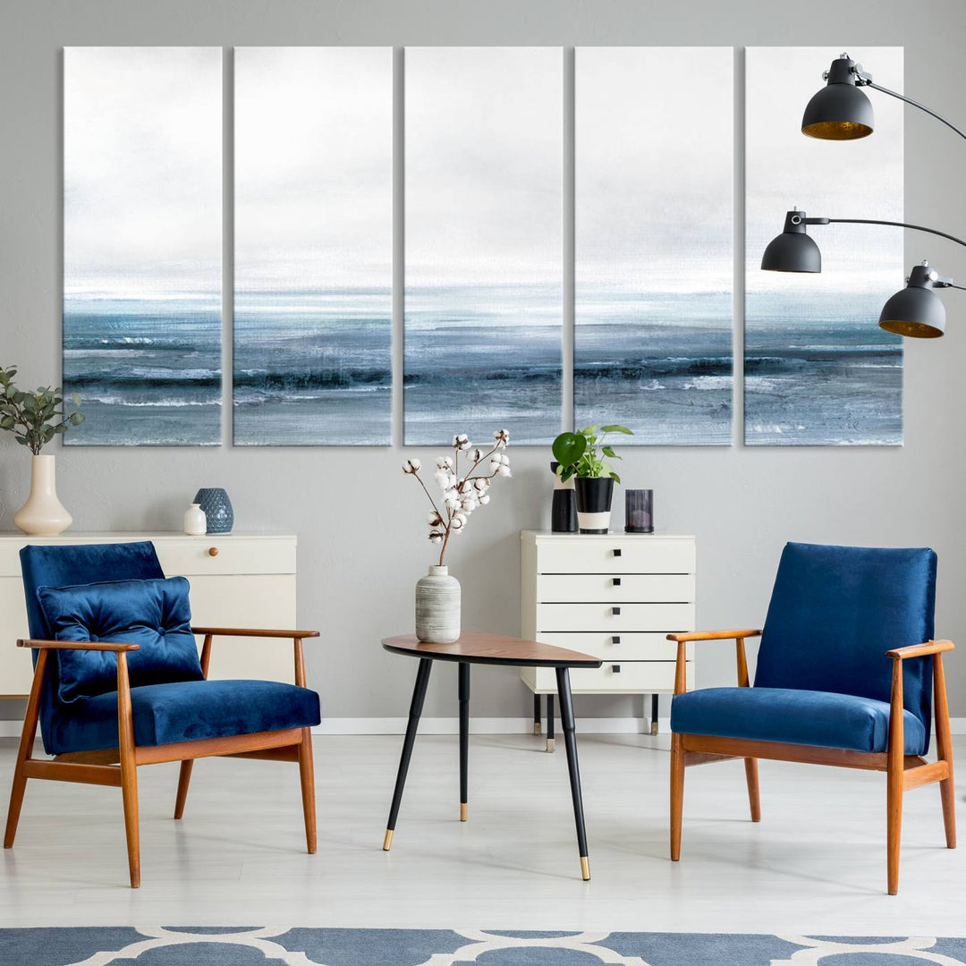 The dining area features Blue Ocean Abstract Artwork on canvas.