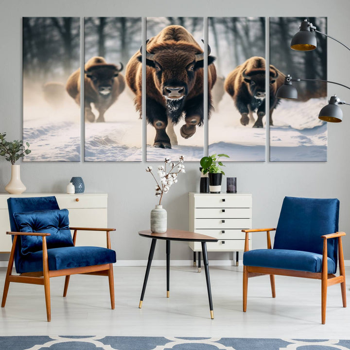 Wall art titled Cow Bighorn shows three bison running through snow in a forest.