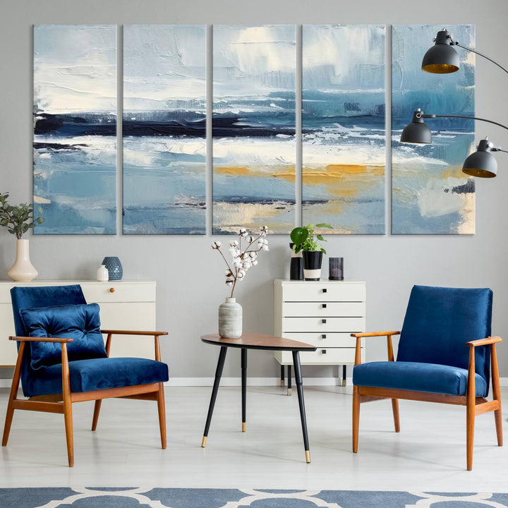 The Abstract Ocean Canvas Wall Art in coastal blue and gold enhances the modern kitchen.