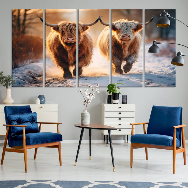 The wall art is a Scottish Highland Cow Horn canvas print featuring cows on a snowy path bathed in warm sunlight, serving as a rustic decor piece.