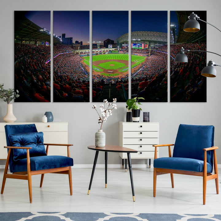 A canvas print of Houston Minute Maid Park at dusk is mounted on the wall.