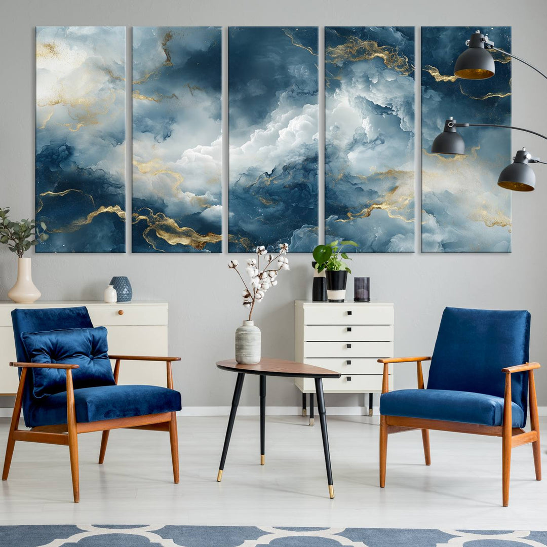 Modern living room featuring the Large Abstract Print - Luxe Blue and Gold Abstract Canvas Wall Art that showcases a bold cloudscape, perfect for modern home decor.