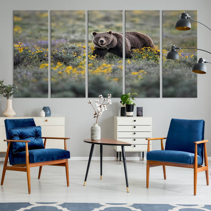 The "Queen of the Tetons" is a stunning canvas wall art print featuring Grizzly 399 walking through a field of yellow and purple flowers, showcasing the gallery-quality finish.