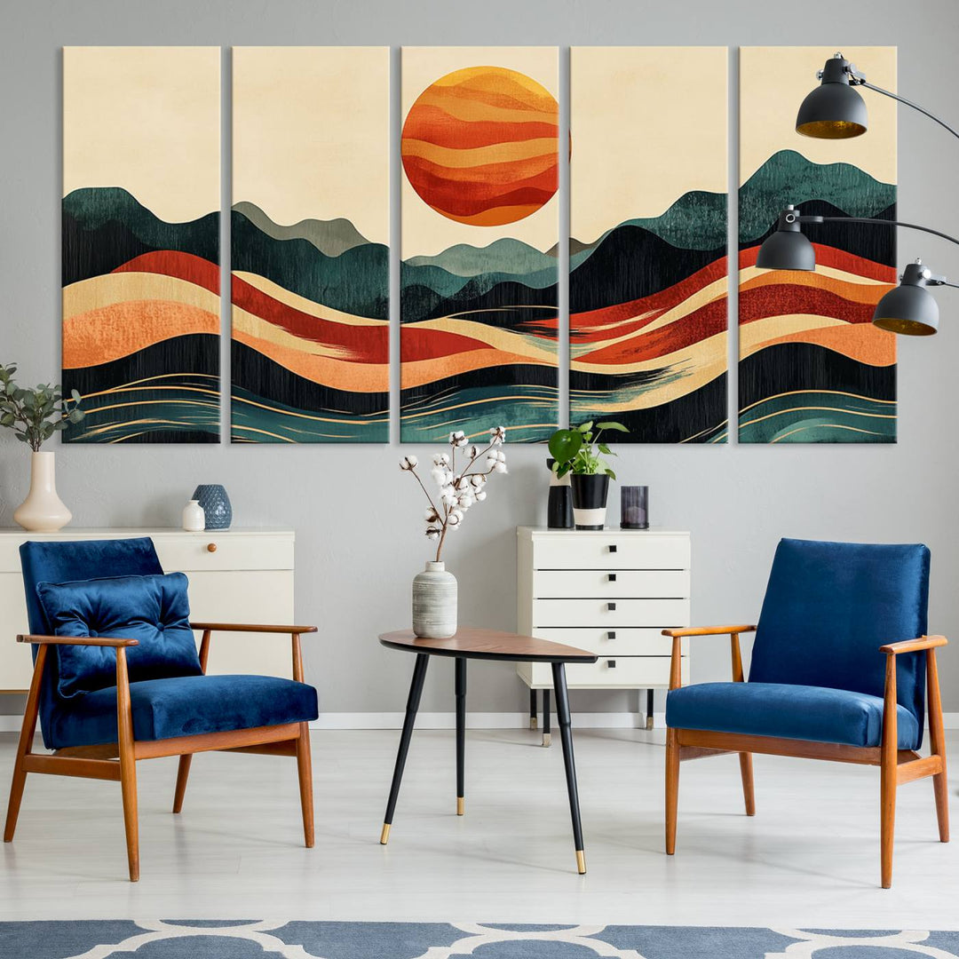 The Mountain Triptych wall art, featuring a design of the sun, mountains, and waves, is displayed prominently on the wall.