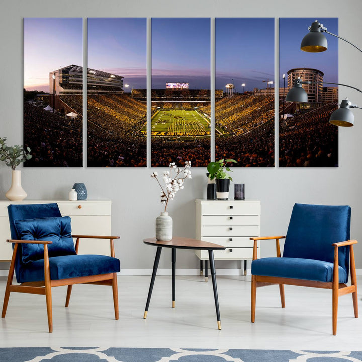 The Iowa Hawkeyes Kinnick Stadium Wall Art Canvas Print captures a sunset scene, making it perfect for display on a wall.