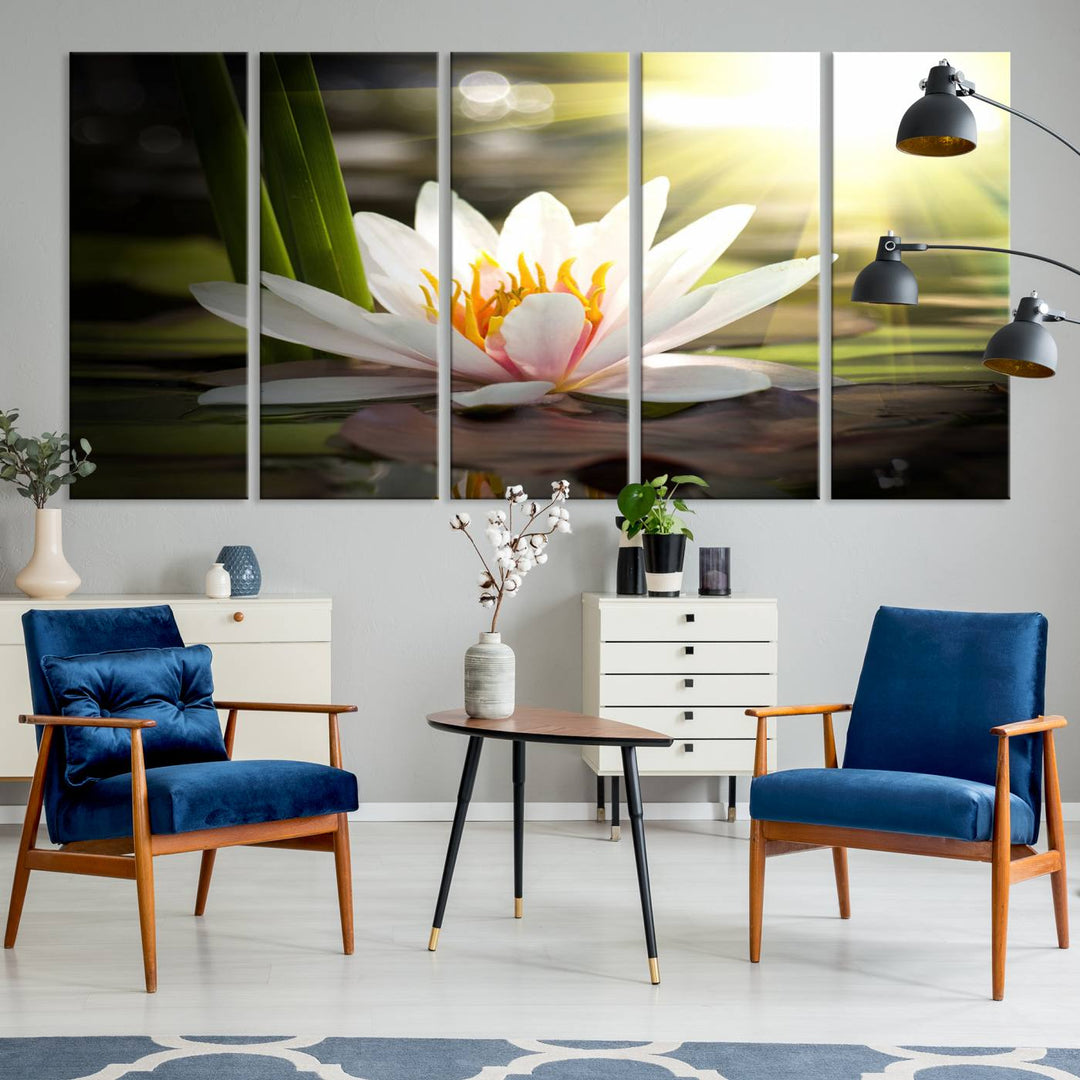 The Lotus Flower Wall Art Canvas Print showcases a white water lily with a yellow center floating gracefully in sunlight.