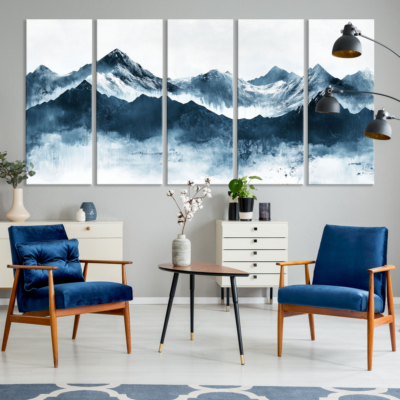 Abstract blue-toned canvas of snowy mountains in misty tones, ideal for minimalist or moody alpine-inspired home decor.