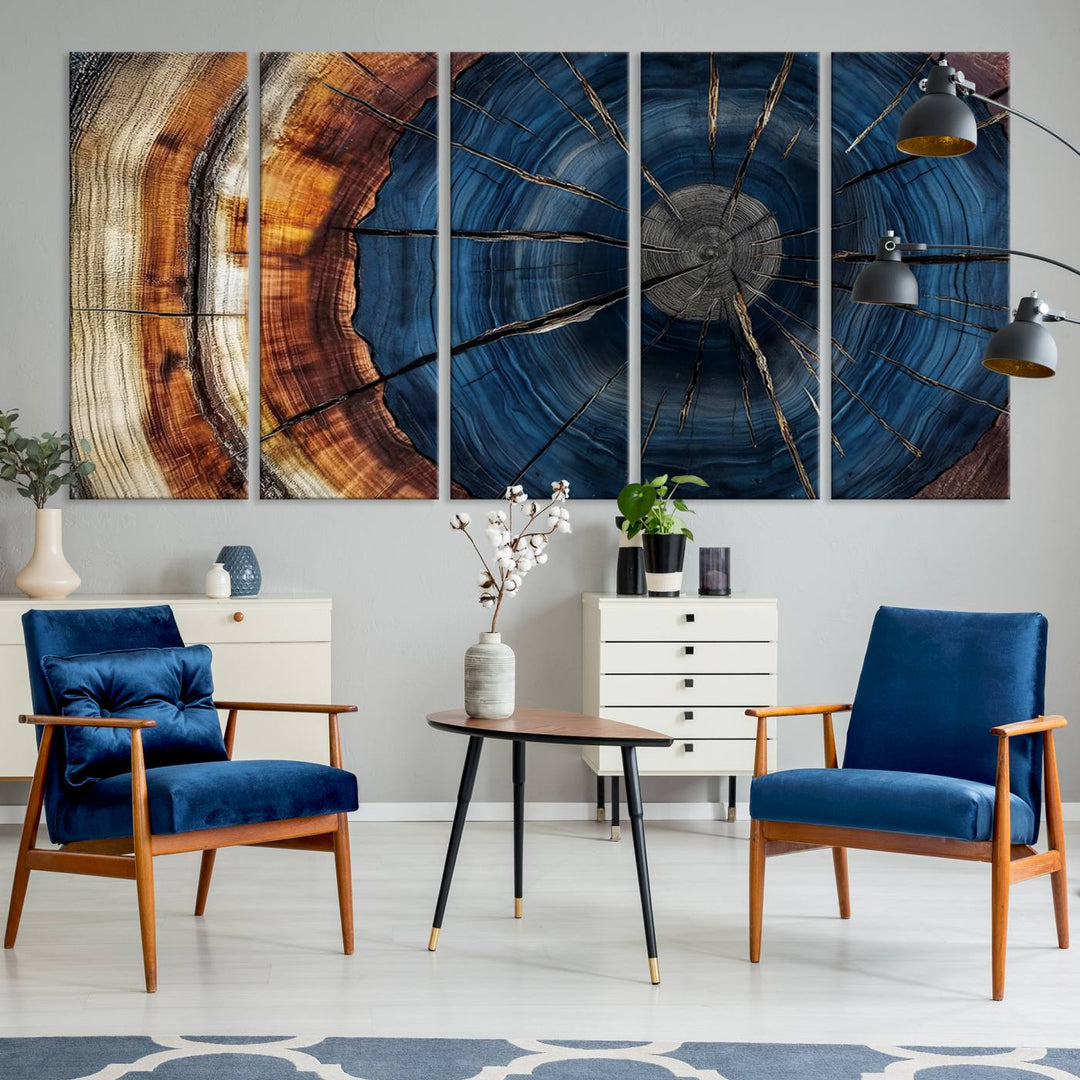 The Abstract Tree Rings Canvas Print features blue, brown, and orange rings that highlight wood grain and natures beauty.