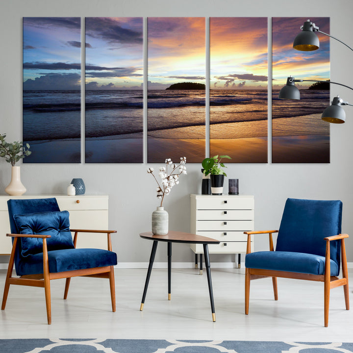 A tropical beach at sunset with waves gently washing ashore, reflecting golden and purple hues in the sky, creating a tranquil coastal scene.