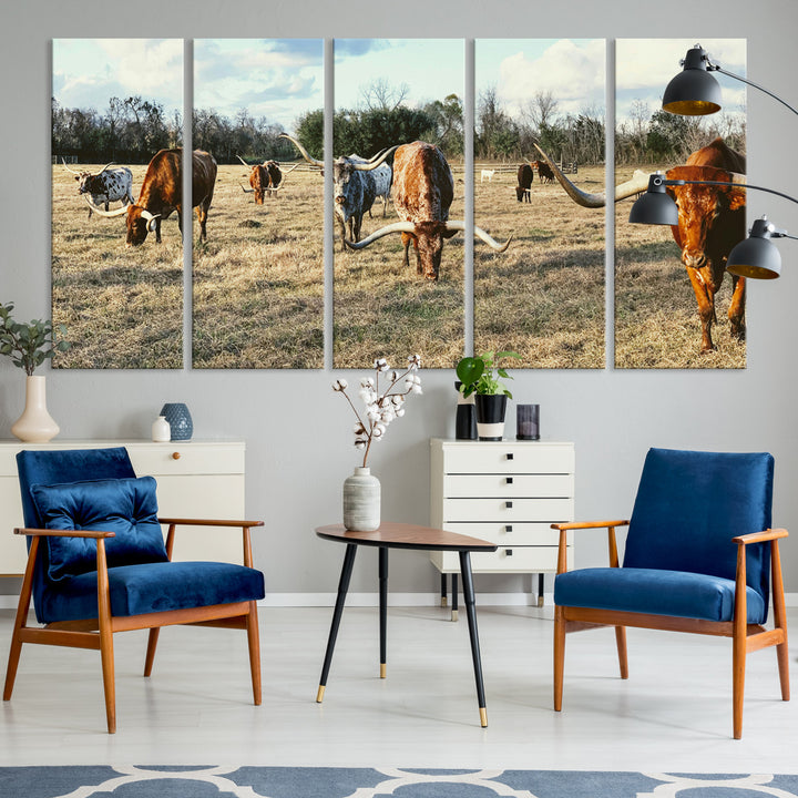 A herd of Texas Longhorn cattle grazing in an open field under a partly cloudy sky, capturing a rustic and Western ranch aesthetic.