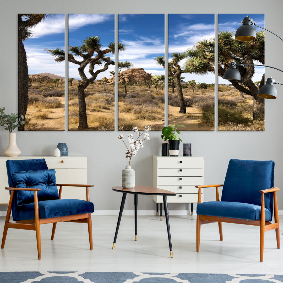 Scenic Joshua Tree landscape with rugged desert terrain, golden dry grass, and a deep blue sky, creating a warm, rustic Southwestern aesthetic.