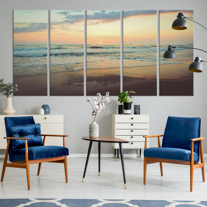 Warm sunset over gentle ocean waves with pastel sky and reflections on wet sand, creating a calm and soothing beach ambiance.
