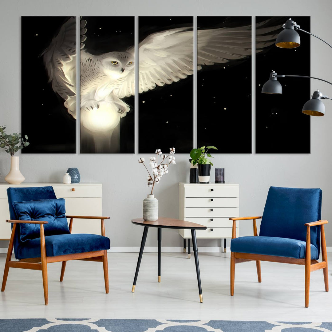 The Night Owl Art graces the wall with its depiction of a snowy owl on a glowing orb, perfect for modern decor.