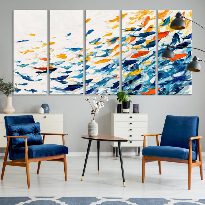 A colorful Abstract Fish Shoal Canvas Print hangs on the wall.