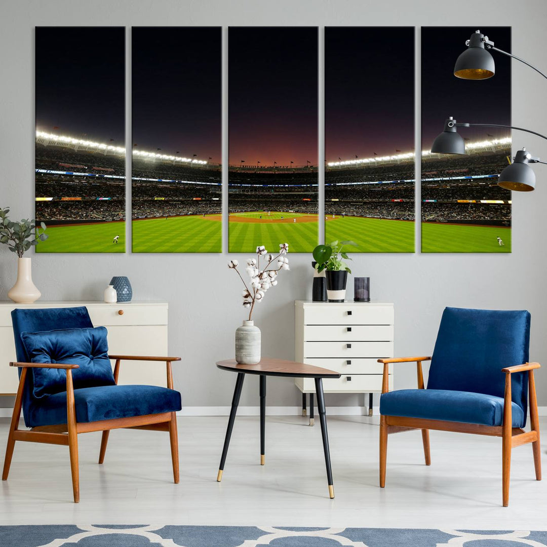 A night game at Yankee Stadium depicted on canvas beneath a sunset sky.