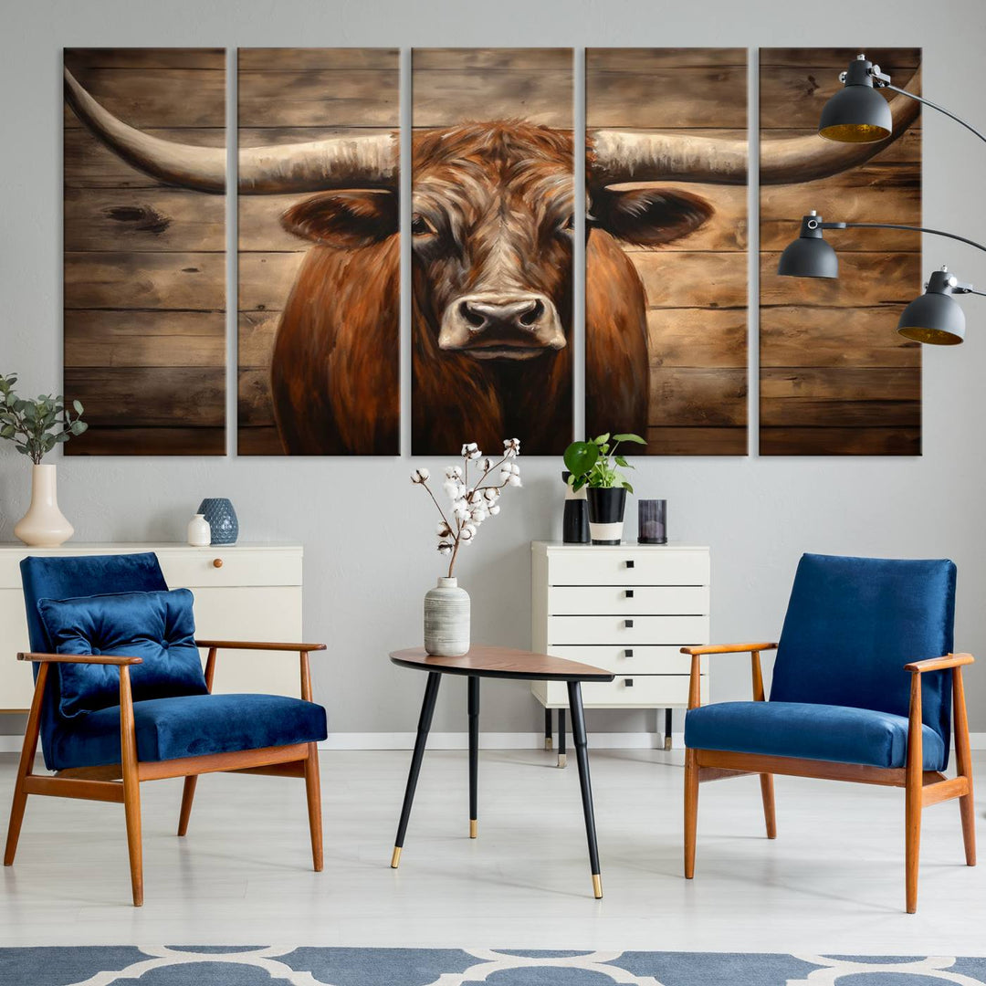 The Longhorn Bull Wall Art, a ready-to-hang canvas print, showcases an image of a brown longhorn cow set against a wooden background, perfect for those looking to enhance their space with rustic farmhouse and western barn decor.