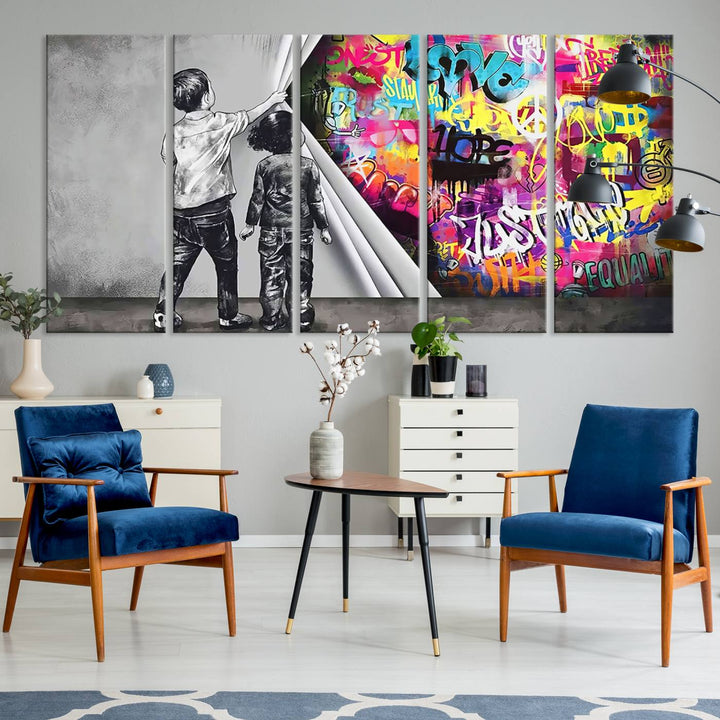 The Banksy Print - Street Art Canvas features a vibrant and bold image of two children lifting a curtain to reveal colorful graffiti. It's ready to hang, adding an urban modern decor vibe.