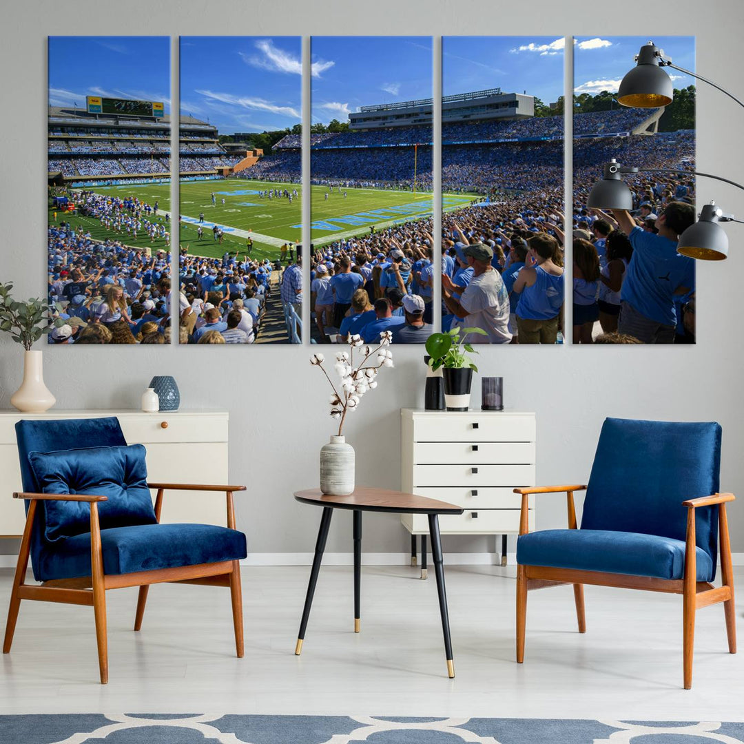 A gallery-quality canvas wall art print featuring the University of North Carolina Tar Heels Football Team and Chapel Hill's Kenan Memorial Stadium adorns the cafe wall.