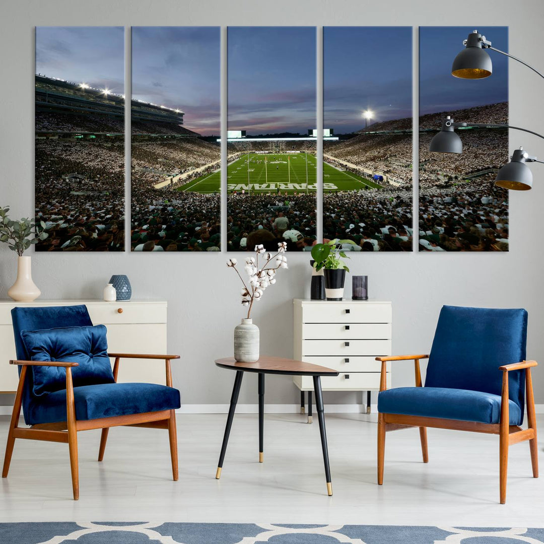 Wall art featuring a stadium at dusk with full stands—ideal for the Michigan State Spartans Football Team Canvas Print.