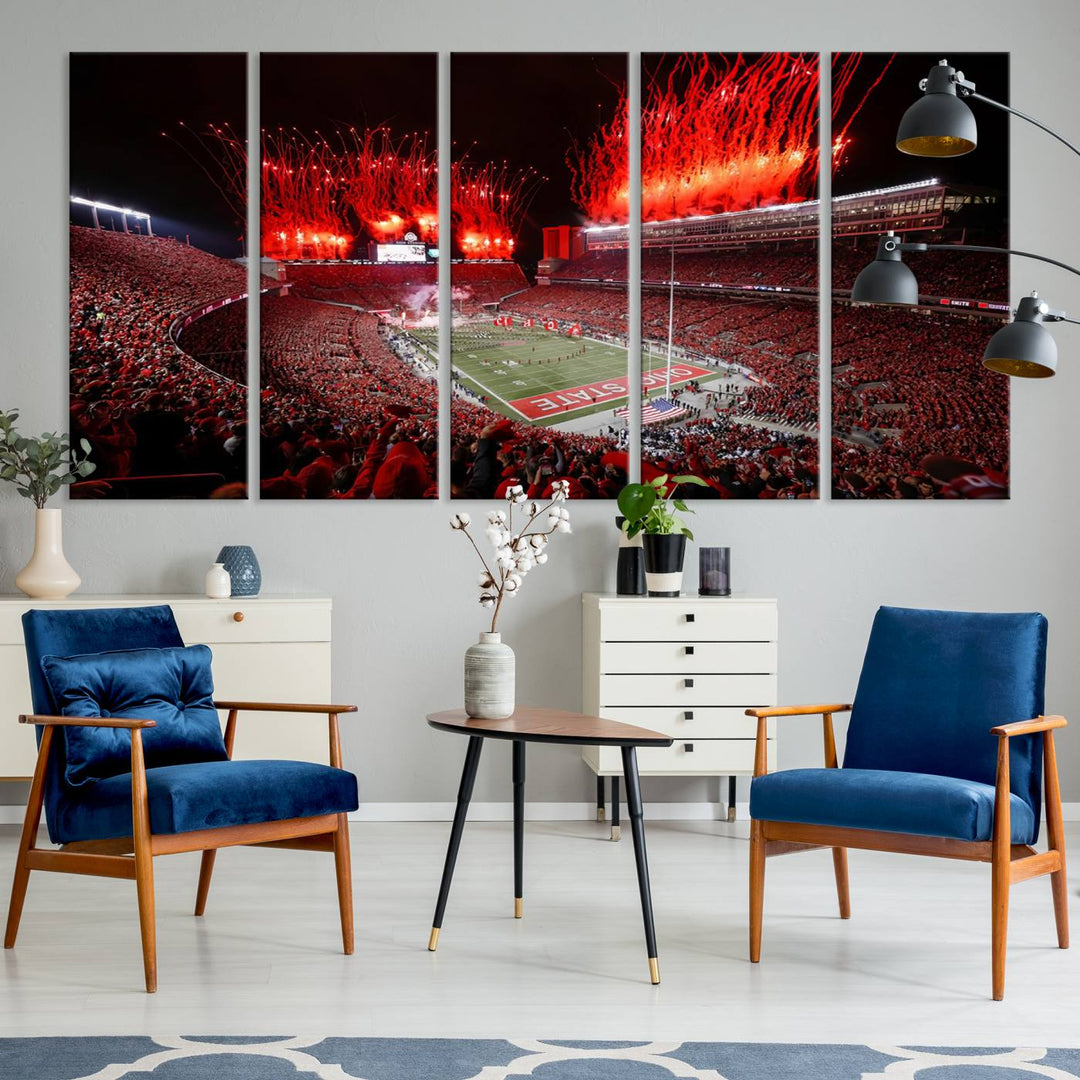 A vibrant red canvas art of a packed Ohio State Buckeyes stadium at night with fireworks.