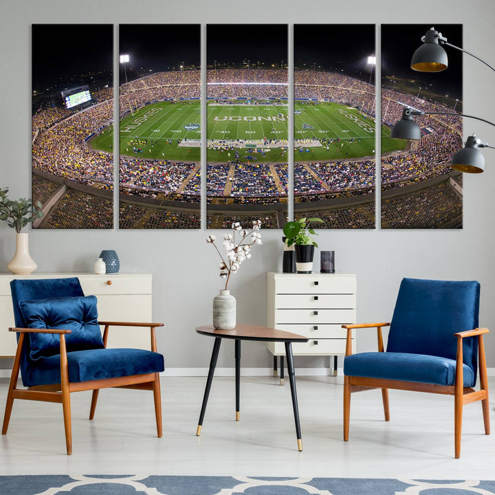 A large football stadium at night, featuring the UCONN Huskies, is depicted on the East Hartford Pratt & Whitney Stadium Wall Art Canvas Print.