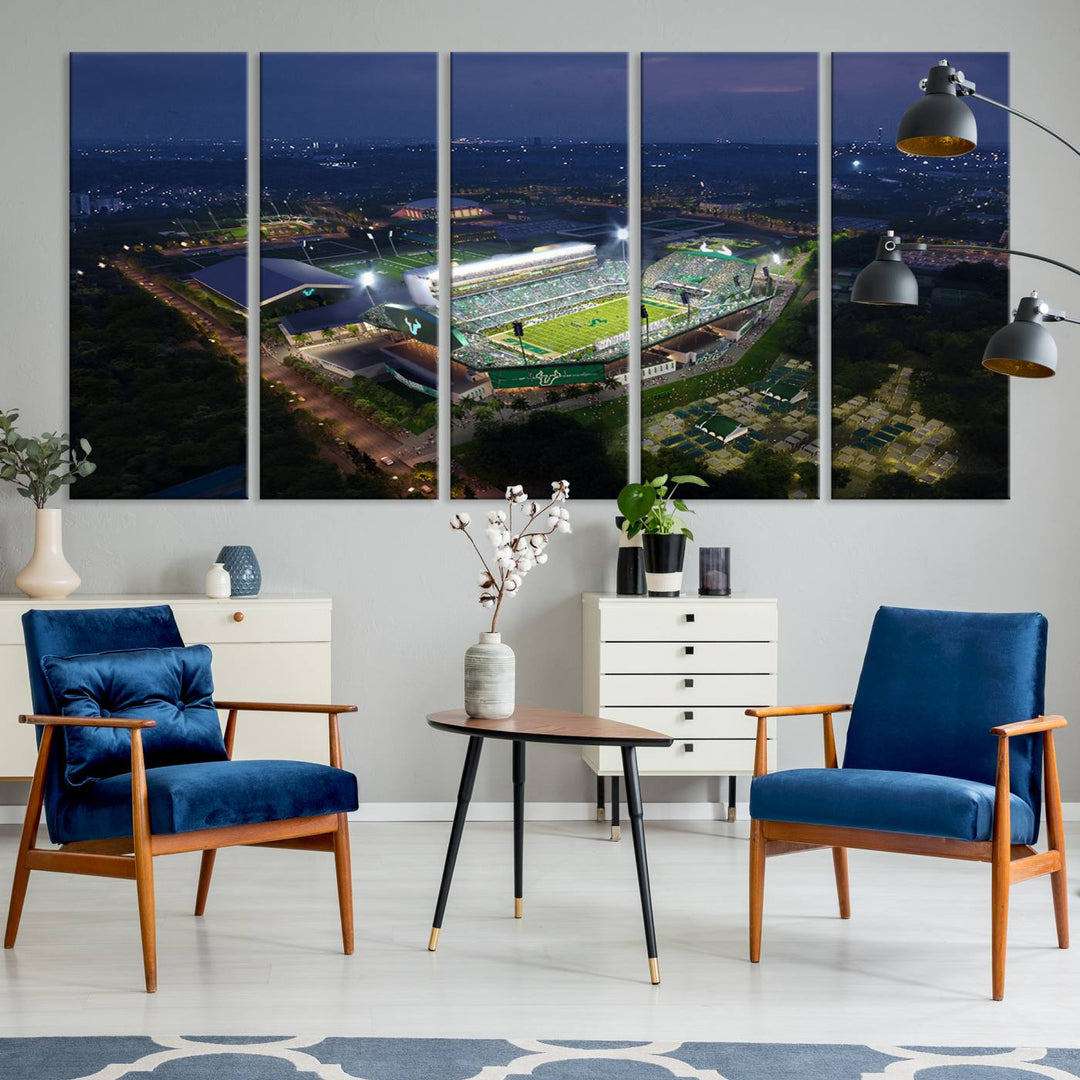 The USF Bulls Football Team Wall Art Canvas Print showcases the Tampa USF Football Stadium at night with city lights.