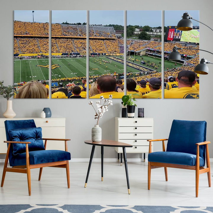 A Puskar Stadium canvas print decorates the modern living room shelf.