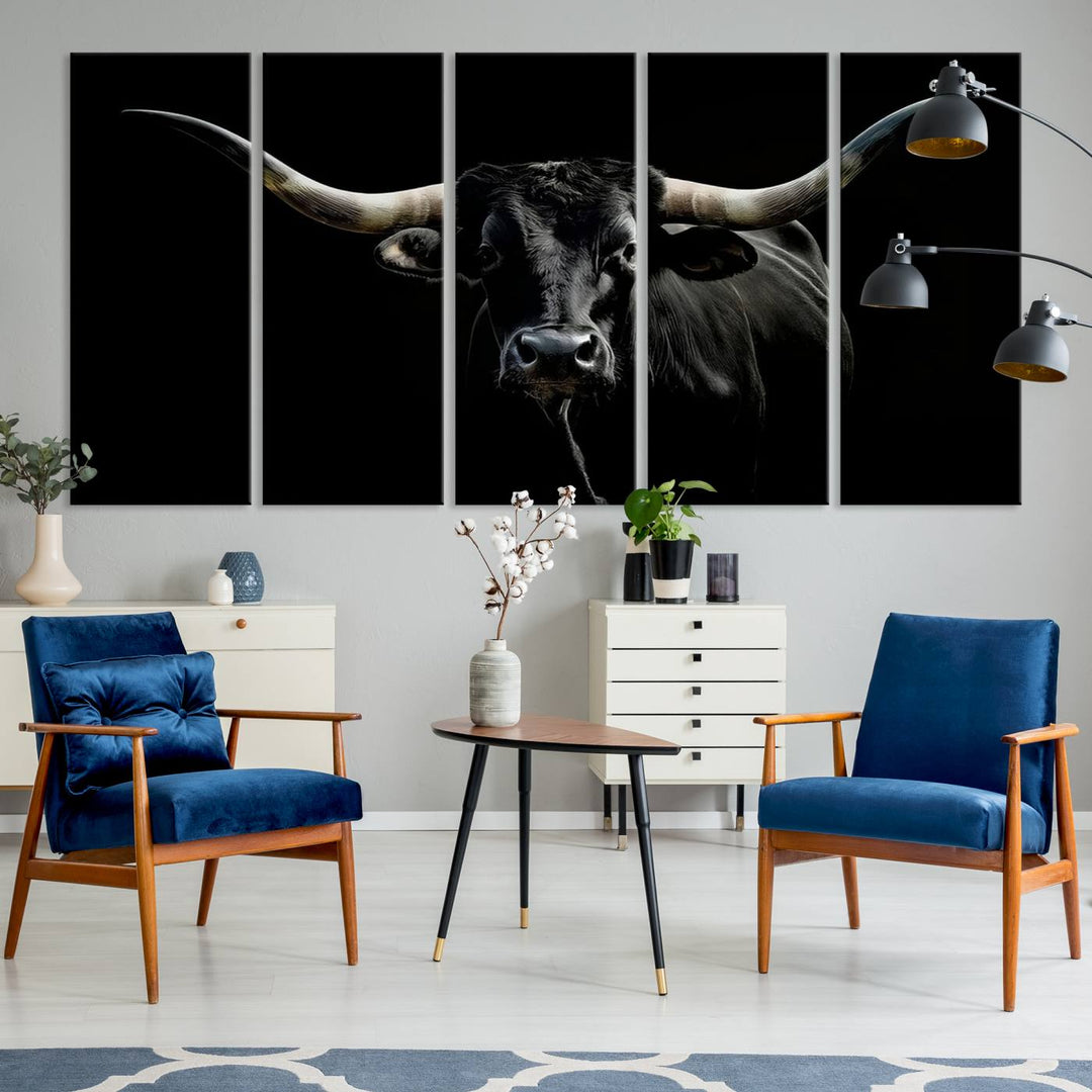 The Texas Black Longhorn Bull Canvas Print, featuring large curved horns set against a dark background, is ideal for Western decor.