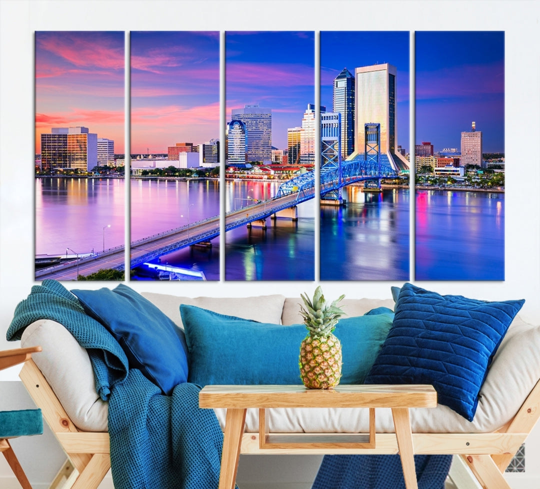 The Jacksonville Wall Art Canvas Print, showcasing the Jacksonville cityscape over a river at sunset, is elegantly crafted on museum-quality canvas with a UV-protective coating. Ready to hang, it elevates your space with its sophisticated charm.