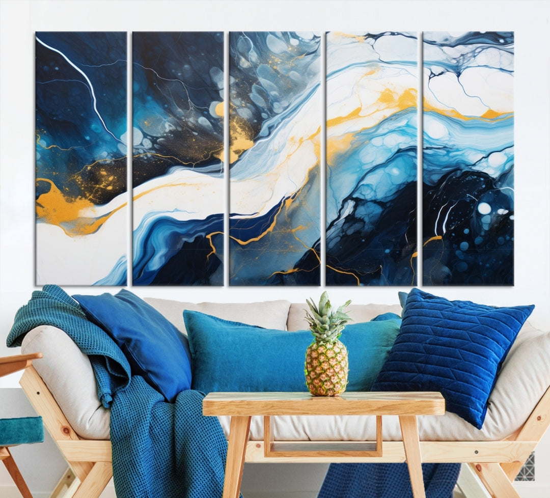 The Navy Blue Abstract Wall Art Canvas Print, displaying an exquisite array of blue, white, and gold swirls, is crafted on museum-quality canvas and enhances the space with its sophisticated elegance.