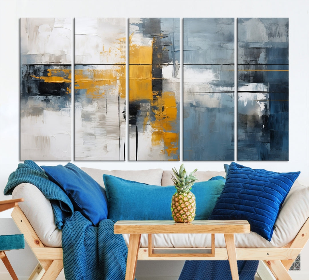 The Orange Abstract Wall Art Print features a series of white, blue, black, and yellow blocks arranged in a triptych format on museum-quality canvases. Proudly made in the USA and offered with free shipping.