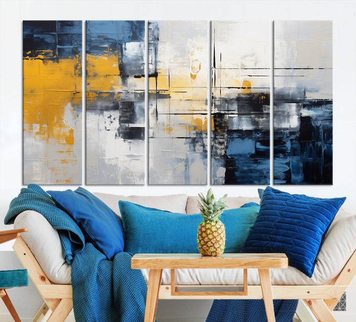 The Yellow Orange Blue Abstract Wall Art Print on gallery-wrapped, museum-quality canvases adds a vibrant touch to the room.