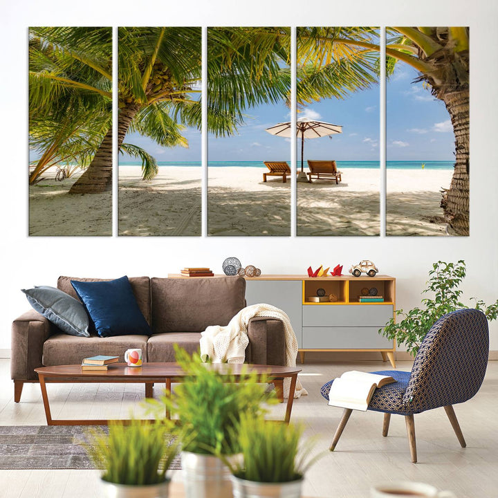 The canvas art print titled Lounge Chairs Palm Trees on Tropical Beach offers free shipping.