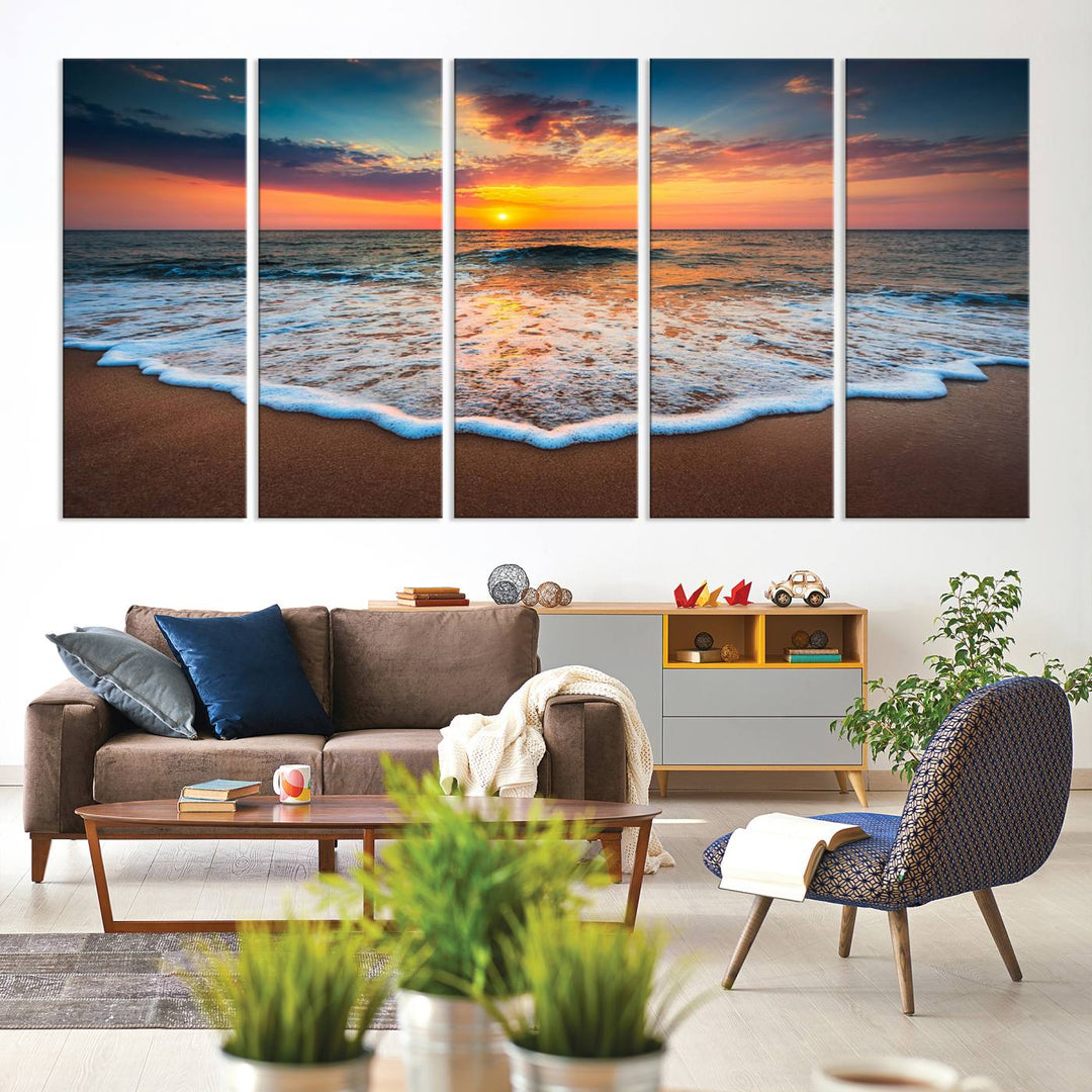 A Sunset with Calm Waves on the Beach Wall Art Canvas Print adorns the dining room.